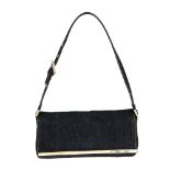 FENDI - a denim baguette handbag. Crafted from dark blue denim with brown leather accents, a