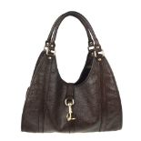 GUCCI - a brown leather Guccissima handbag. Crafted from brown embossed Guccissima leather,