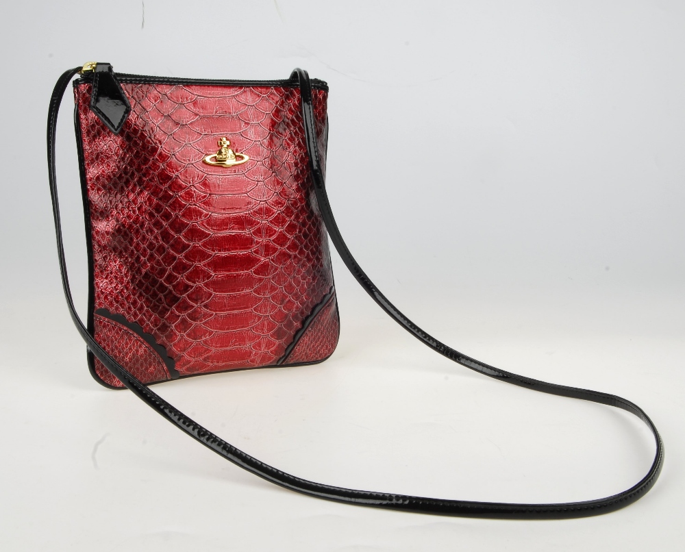 VIVIENNE WESTWOOD - a Frilly Snake crossbody handbag. Designed with a pink faux snakeskin exterior - Image 10 of 10