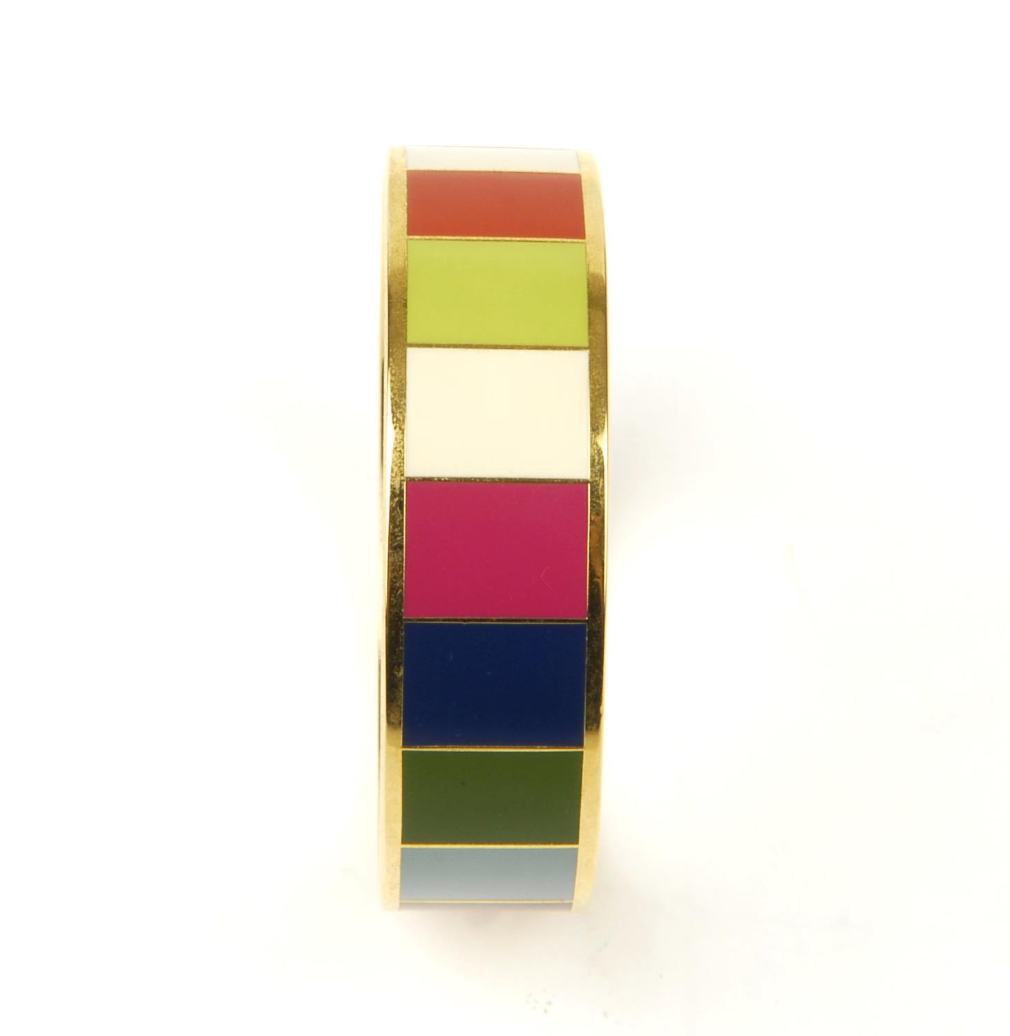 COACH - a Legacy striped bangle. The gold-tone bangle featuring multicoloured striped enamel inlay - Image 4 of 9