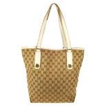 GUCCI - a Charmy handbag. Designed with maker's classic monogram canvas exterior with cream