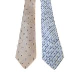 CHANEL - two silk ties. To include a grey and blue example with a diagonal striped pattern, together