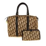 CHRISTIAN DIOR - a vintage Boston handbag with matching pouch. Crafted from beige and brown monogram