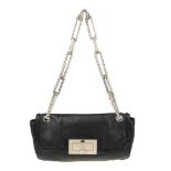 CHANEL - a black leather Mademoiselle Lock Flap handbag. Featuring a black leather exterior,