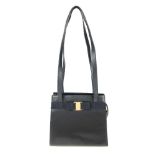 SALVATORE FERRAGAMO - a small Vara handbag. Designed with a smooth navy blue leather exterior,