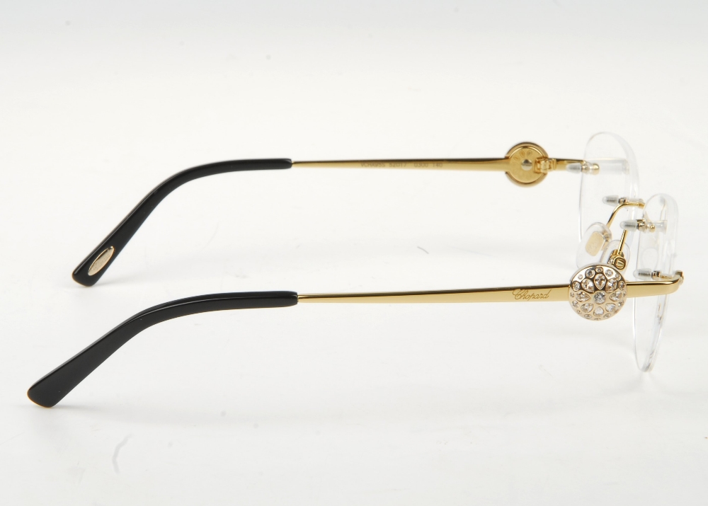 CHOPARD - a pair of rimless glasses. Featuring rimless demo print lenses, gold-tone metal arms and - Bild 6 aus 7