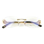 CHOPARD - a pair of rimless glasses. Featuring rimless demo print lenses, gold-tone metal arms and