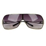 VIVIENNE WESTWOOD - a pair of sunglasses. Featuring oversized grey gradient lenses with green