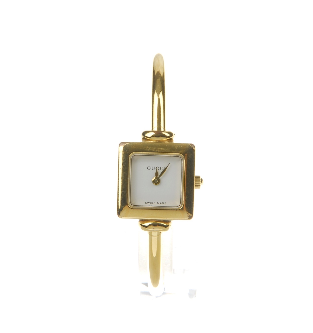 GUCCI - a lady's 1900 half bangle watch. Designed with a gold-tone square case with rounded corners, - Image 2 of 5