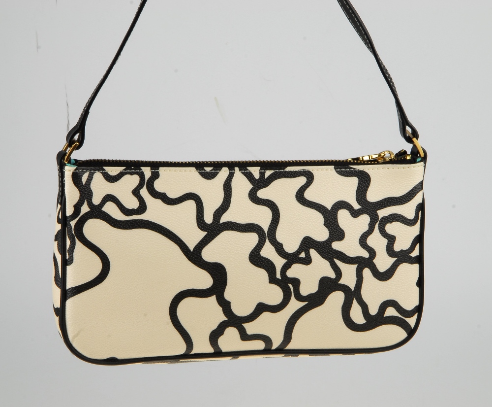 TOUS - a baguette handbag. Featuring a cream and black coated canvas exterior with black leather - Bild 5 aus 9