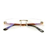 CHOPARD - a pair of rimless glasses. Featuring rimless demo print lenses, wooden arms with gold-tone
