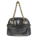 STELLA MCCARTNEY - a handbag. Featuring a faux black leather exterior with antiqued gold-tone