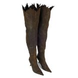 ROBEERTO CAVALLI - a pair of suede thigh-high boots. Crafted from dark brown suede, featuring a