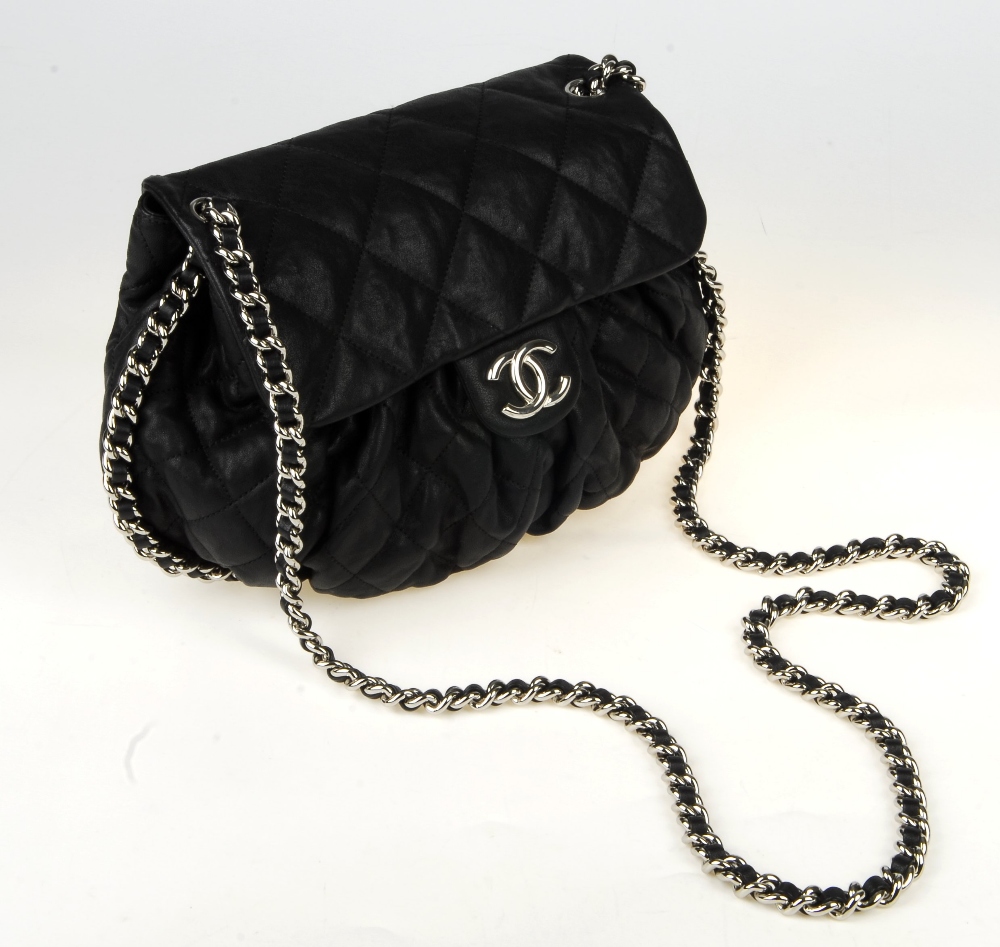 CHANEL - a Chain Around Flap handbag. Crafted from black quilted leather, featuring soft pleats to - Image 12 of 15