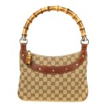 GUCCI - an Anita bamboo handle handbag. Featuring maker's GG canvas exterior, pebbled tan leather