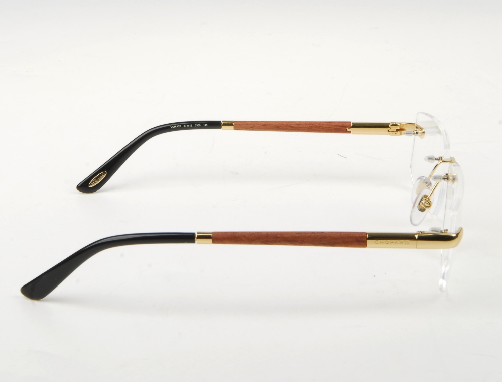 CHOPARD - a pair of rimless glasses. Featuring rimless demo print lenses, wooden arms with gold-tone - Bild 7 aus 9