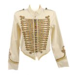 STELLA MCCARTNEY - a girl's military style Will jacket. Crafted from cream coloured cotton,