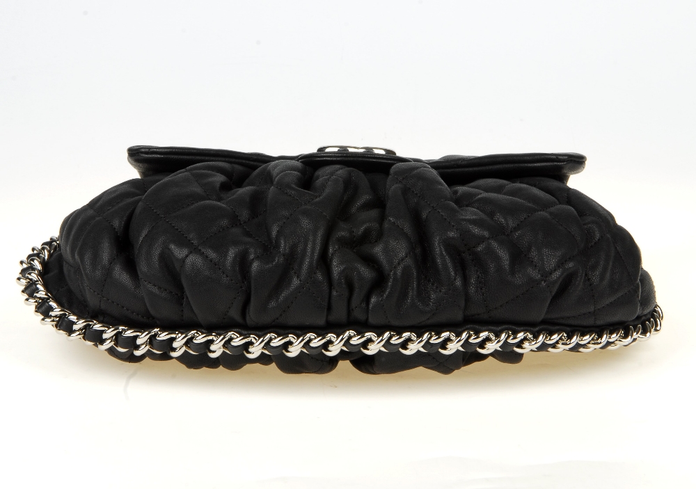 CHANEL - a Chain Around Flap handbag. Crafted from black quilted leather, featuring soft pleats to - Image 10 of 15