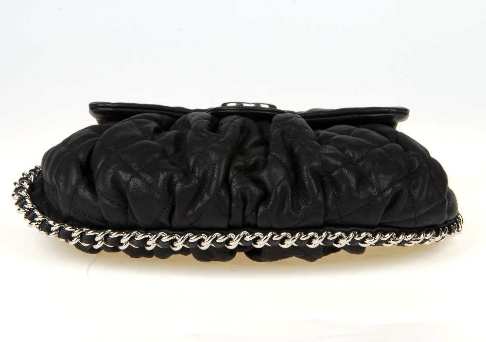 CHANEL - a Chain Around Flap handbag. Crafted from black quilted leather, featuring soft pleats to - Image 11 of 15