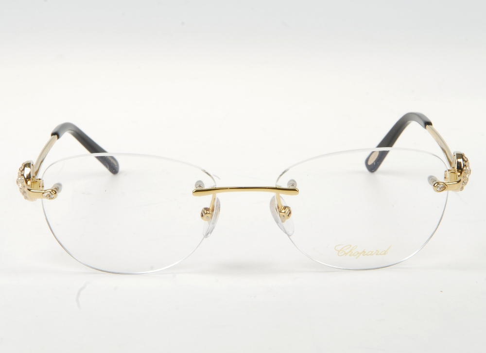 CHOPARD - a pair of rimless glasses. Featuring rimless demo print lenses, gold-tone metal arms and - Bild 2 aus 7