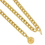 CHANEL - a chain belt. Designed as a gold-tone filled curb-link chain, with second draped chain to