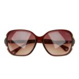 COACH - a pair of sunglasses. Featuring oversized brown gradient lenses, burgundy acetate frames
