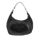 PRADA - a black nylon hobo handbag. Featuring maker's large logo to the front face, single flat