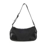 PRADA - a small black nylon handbag. Featuring a black nylon exterior with leather accents, an