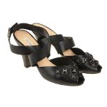 MARC JACOBS - a pair of black leather peep toe sandals. Featuring square stud embellishments, a high