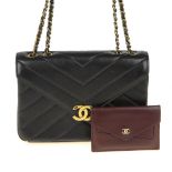 CHANEL - a Chevron Quilted Flap handbag with interior purse. Featuring a chevron quilted black