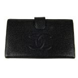 CHANEL - a Caviar leather wallet. The caviar leather exterior with quilted 'CC' logo to the front,