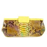 NANCY GONZALEZ - a python skin clutch. Designed with a yellow and brown tonal python skin exterior