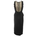 OZBEK - a dress and a skirt. The black full-length sleeveless dress, featuring a white embroidered