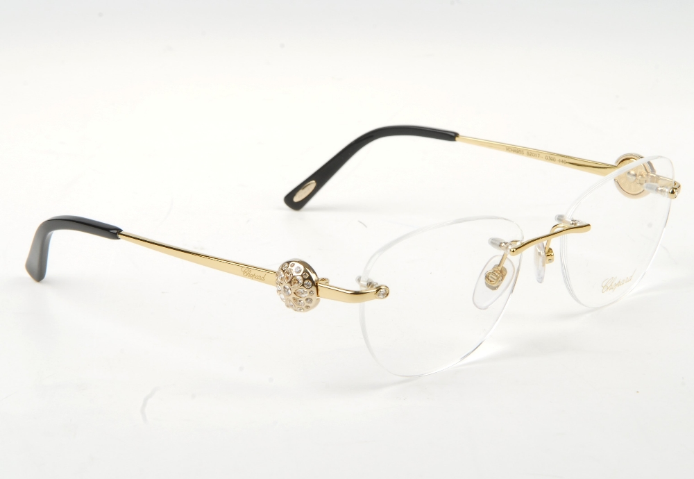 CHOPARD - a pair of rimless glasses. Featuring rimless demo print lenses, gold-tone metal arms and - Bild 5 aus 7