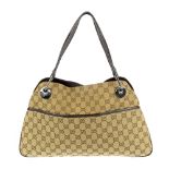 GUCCI - a Monogram Eclipse handbag. Featuring maker's monogram canvas exterior and brown pebbled