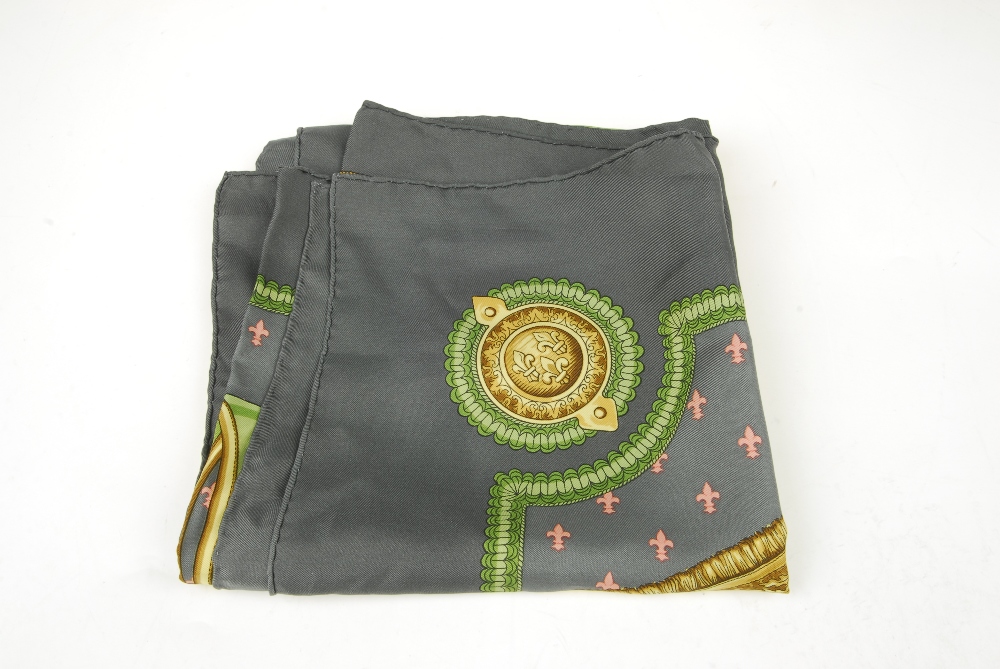 HERMÈS - a 'Selles A Housse' scarf. Designed by Christiane Vauzelles, featuring four green - Image 2 of 5