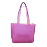 CHANEL - a rubber handbag. Crafted from purple rubber, featuring an open top, flat top handles