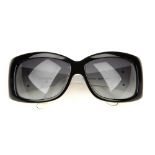 CHANEL - a pair of two-tone sunglasses. Designed with contrasting white and black acetate frames,