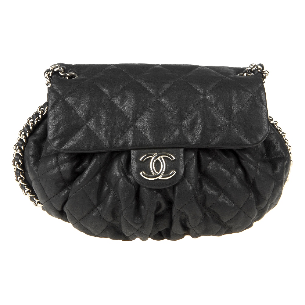 CHANEL - a Chain Around Flap handbag. Crafted from black quilted leather, featuring soft pleats to