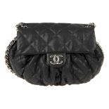 CHANEL - a Chain Around Flap handbag. Crafted from black quilted leather, featuring soft pleats to