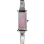 GUCCI - a stainless steel quartz lady's 1500L bangle watch. The pink mother-of-pearl dial, with a