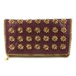 STELLA MCCARTNEY - a Falabella fold-over crystal embellished clutch. Crafted from faux brushed