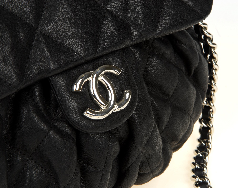 CHANEL - a Chain Around Flap handbag. Crafted from black quilted leather, featuring soft pleats to - Image 13 of 15