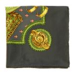 HERMÈS - a 'Selles A Housse' scarf. Designed by Christiane Vauzelles, featuring four green