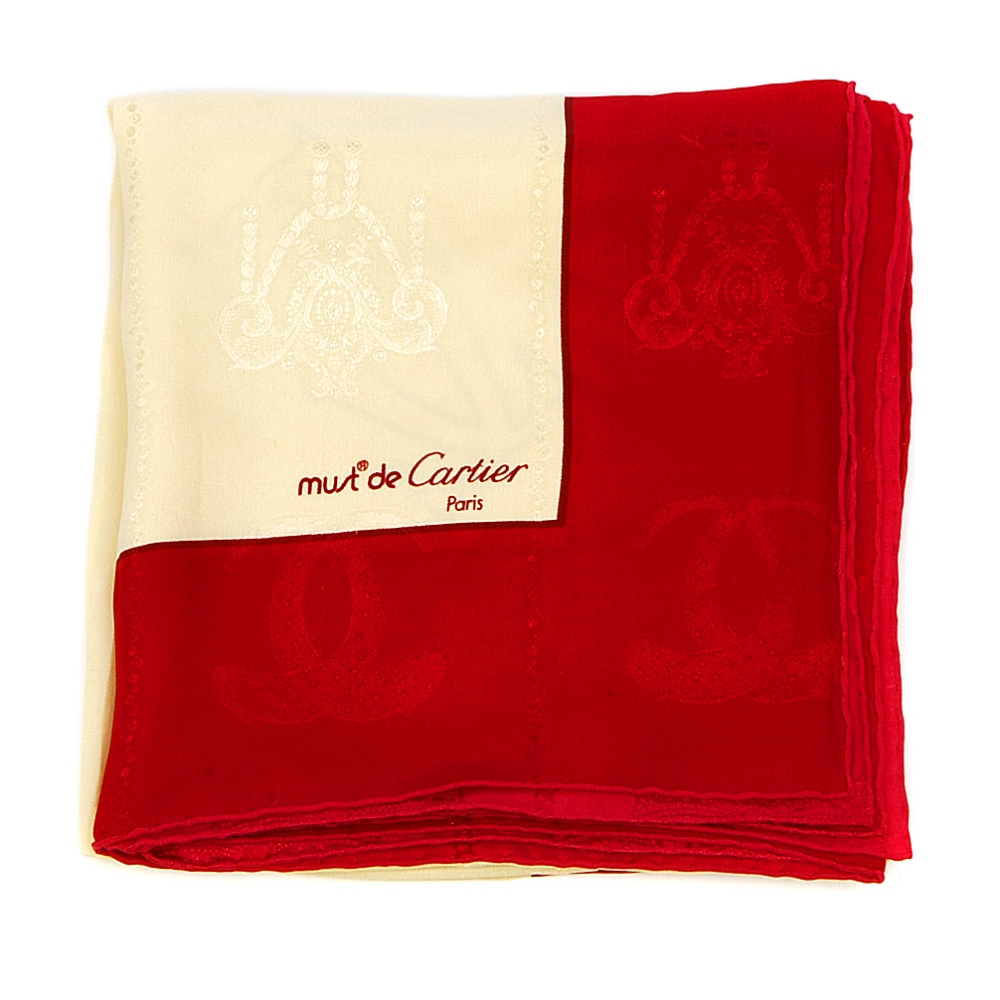 CARTIER - a Must De Cartier silk scarf. Featuring maker's logo emblem on red and ivory jacquard