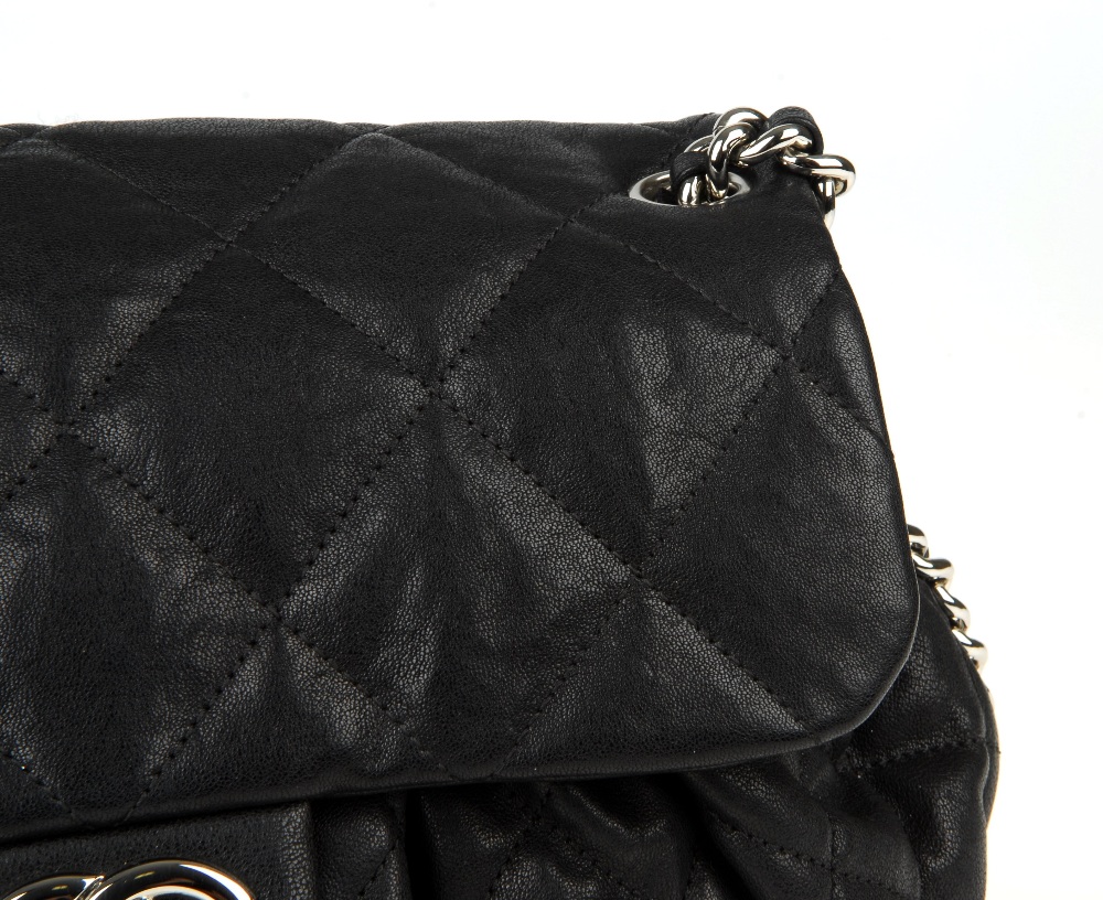 CHANEL - a Chain Around Flap handbag. Crafted from black quilted leather, featuring soft pleats to - Image 3 of 15