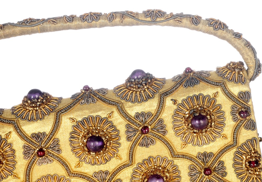 An early 20th century gem-set evening handbag attributed to Van Cleef & Arpels. The gold textile - Image 3 of 10