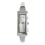 GUCCI - a lady's 127.5 half bangle watch. Designed with an elegant rectangular faceted glass face,
