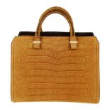 VICTORIA BECKHAM - a matte alligator Victoria handbag. Designed with a firmly structured square