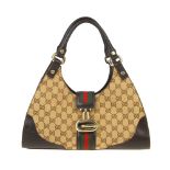 GUCCI - a vintage Web Bardot handbag. Crafted from maker's classic GG monogram canvas, with textured